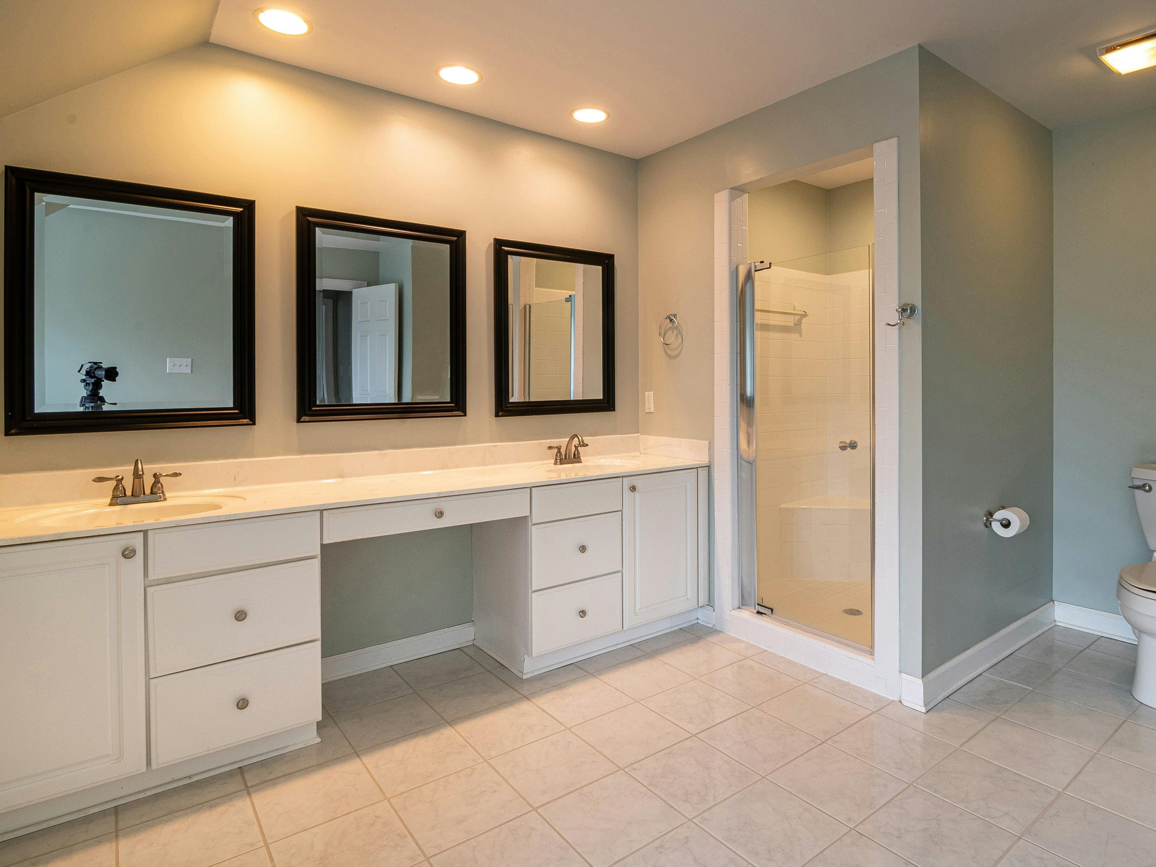 A modern bathroom with a large vanity
