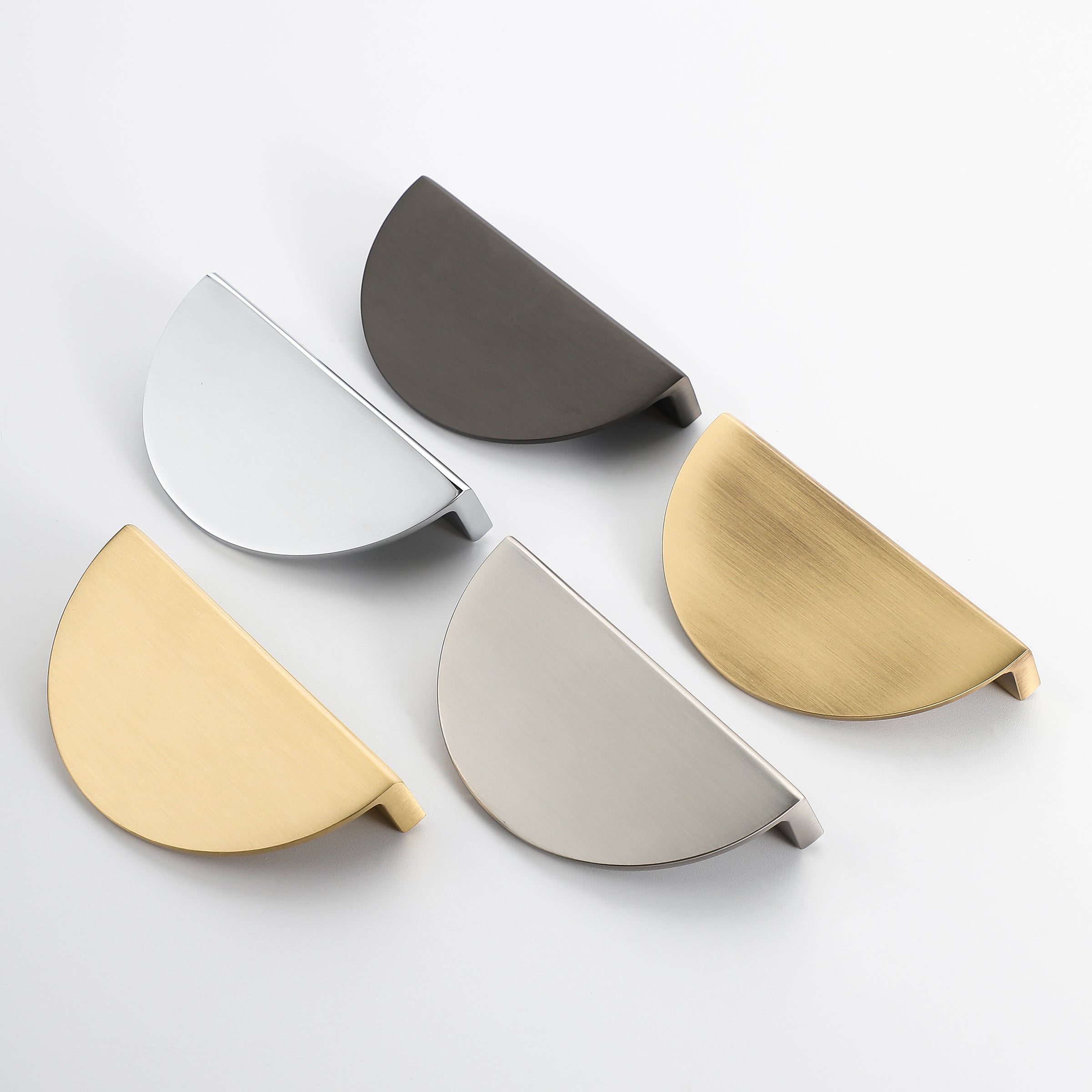 Set of half moon drawer pulls in five finishes: brushed brass, matte black, polished chrome, satin nickel, and gold.