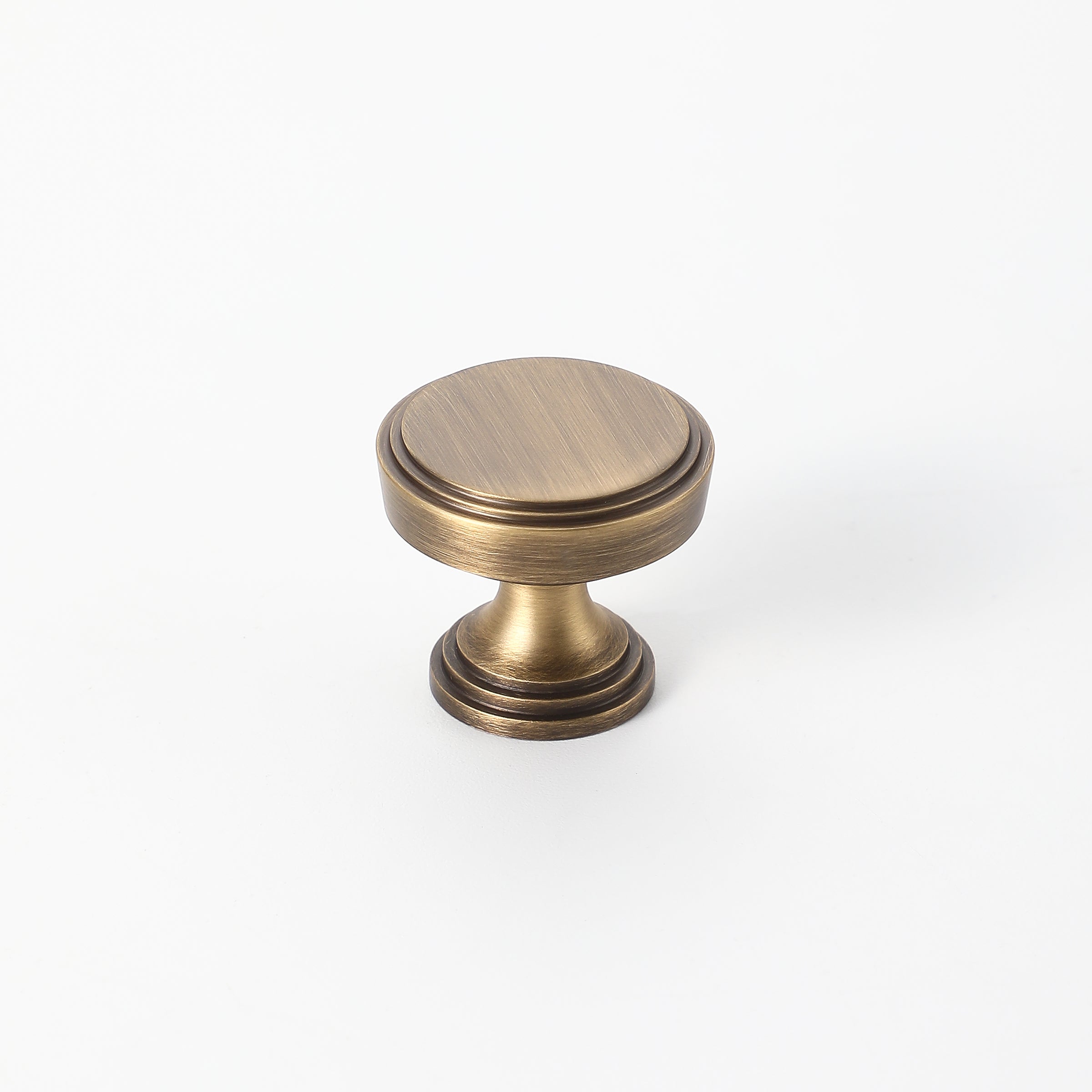Antique bronze drawer knob with brushed finish, designed for cabinets and wardrobes.