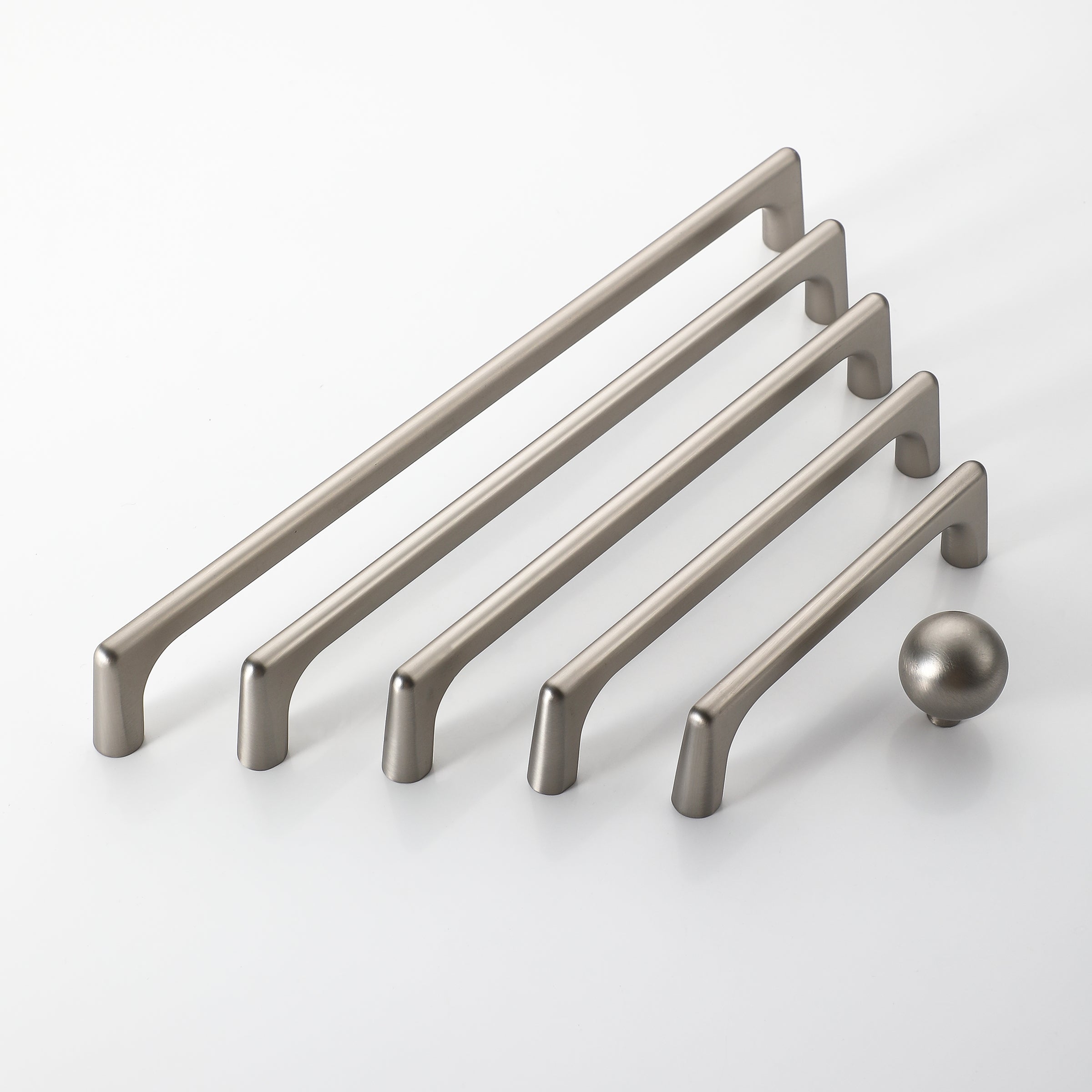 Set of brushed nickel D-shape kitchen cabinet handles in various sizes.