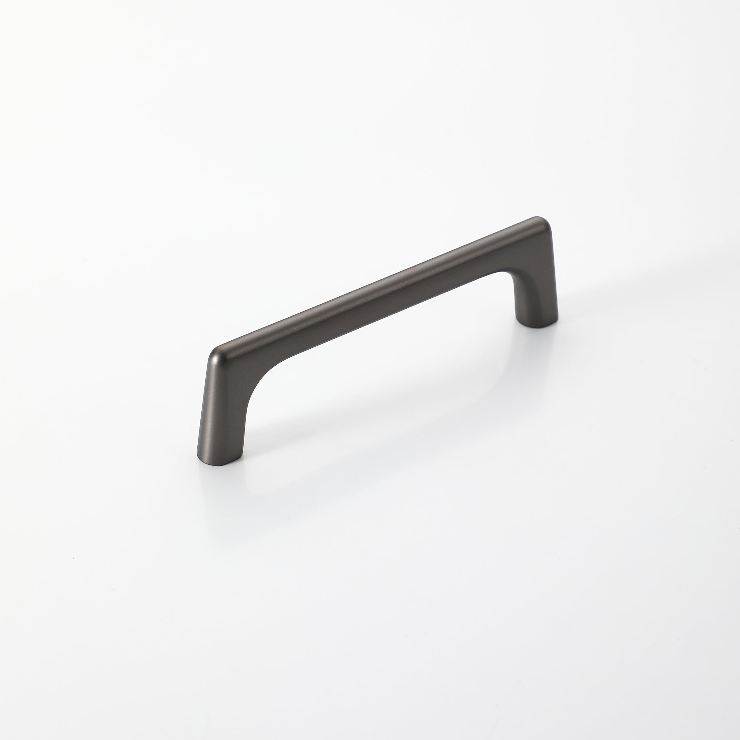 Elegant D-shape black kitchen cabinet handle on a white background.