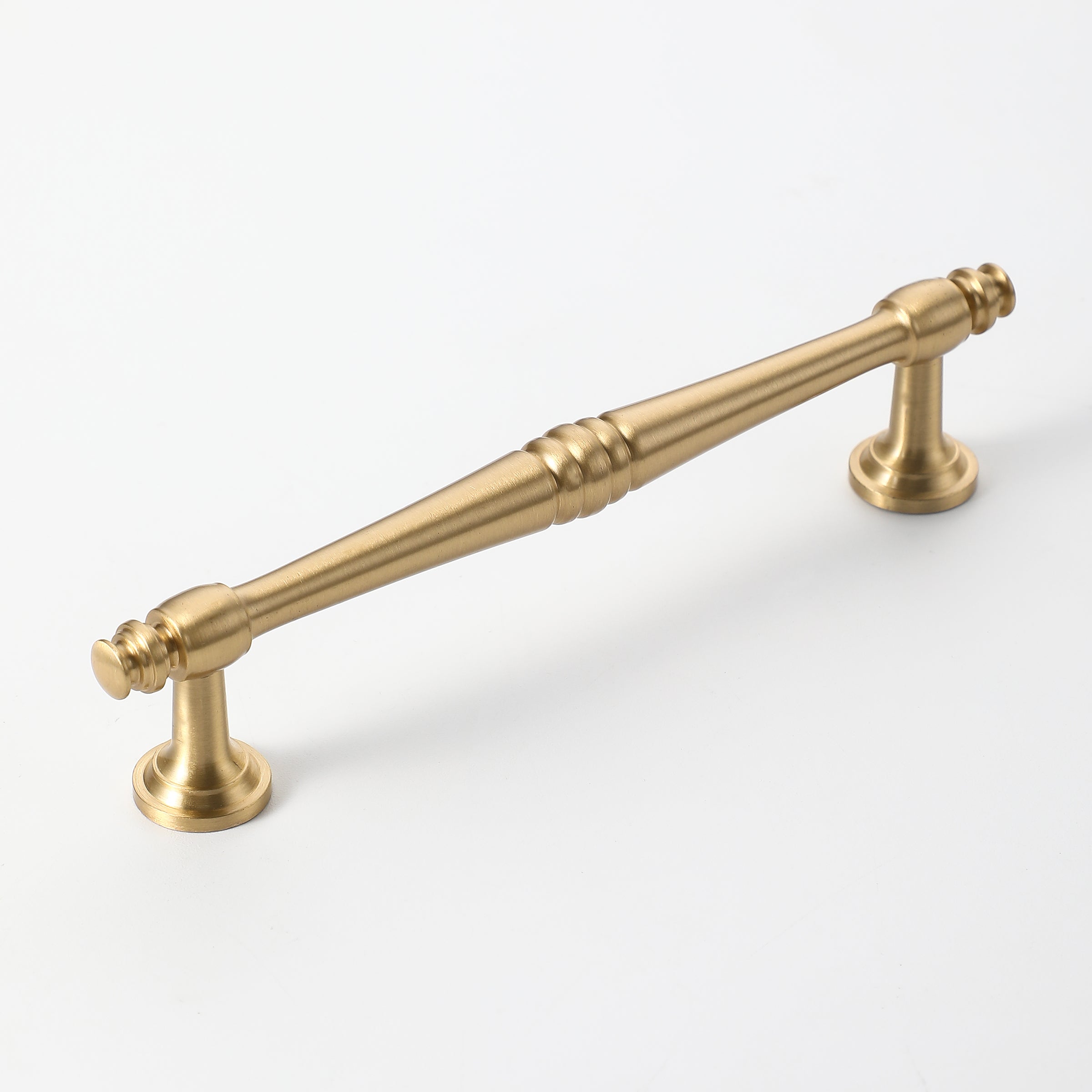 Classic brushed gold kitchen cabinet handle with smooth finish and spindle design.